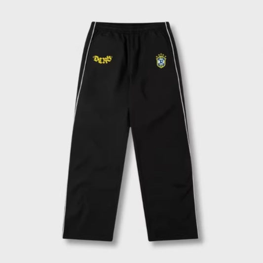Men's sporty jogging pants with elastic waistband, side contrast piping, and straight cut Mune Fashion
