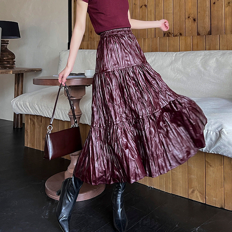 Women's tiered maxi skirt in coated crinkle material with elastic comfort waistband Mune Fashion