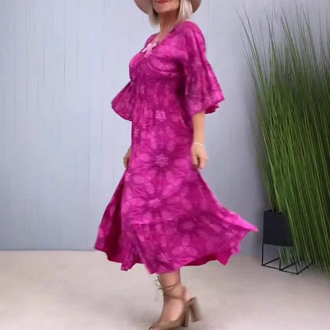 Women's flowing kaftan midi dress with V-neck, loose silhouette, tiered skirt, and three-quarter sleeves Mune Fashion