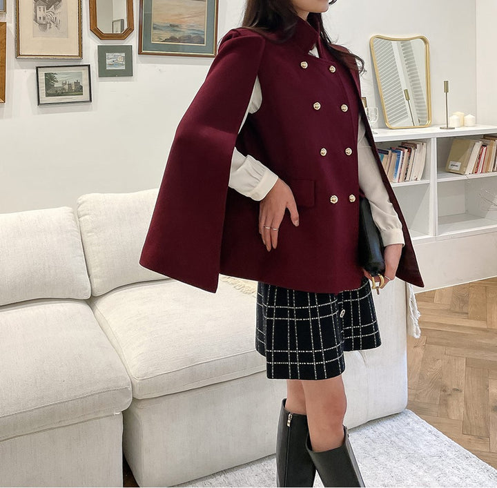 Women’s coat cape in tailoring look with double-breasted button placket and distinctive shoulder Mune Fashion