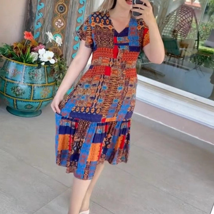 Women’s layered midi dress with V-neck, short sleeves, and patchwork look Mune Fashion