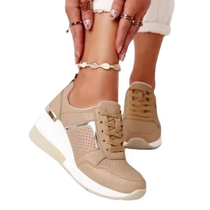 Women's wedge sneakers with perforated upper material, padded comfort collar and reflective metal details Mune Fashion
