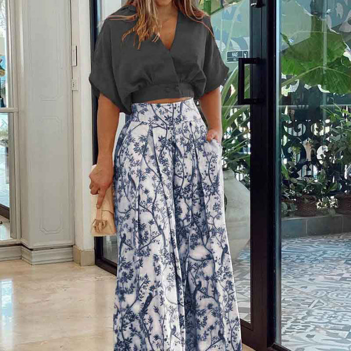 Women Elegant high-waisted palazzo pants with wide leg, pleats and side pockets Mune Fashion