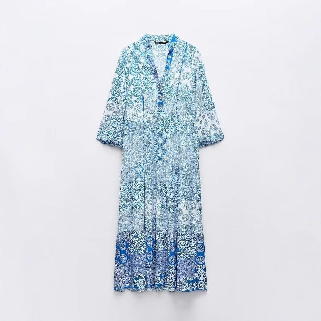 Women's maxi dress in patchwork print with V-neck, tiered skirt, and 3/4 sleeves Mune Fashion