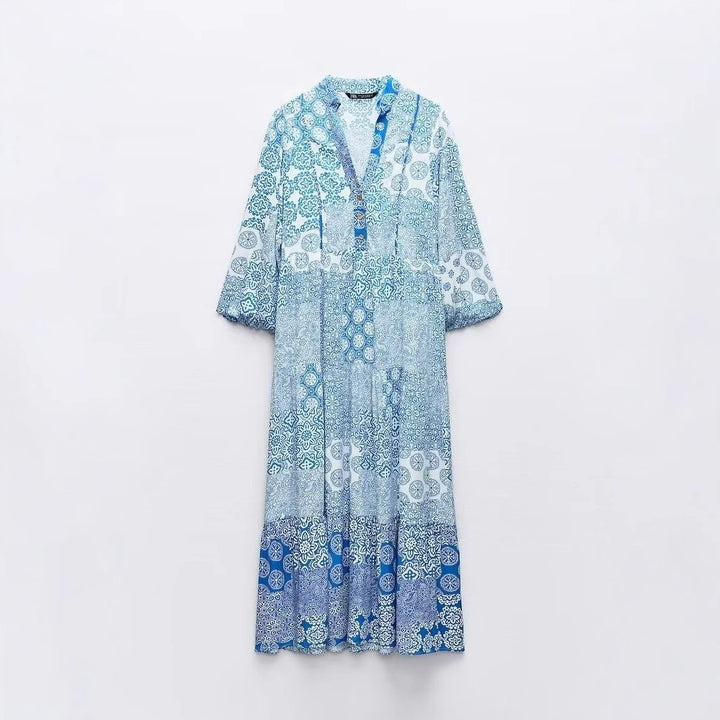 Women's maxi dress in patchwork print with V-neck, tiered skirt, and 3/4 sleeves Mune Fashion