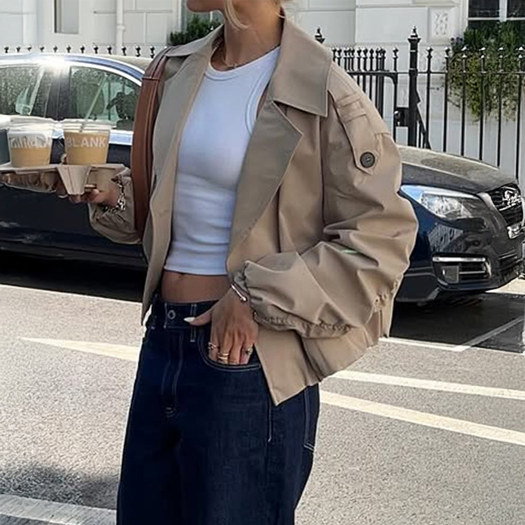 Women's shortened trench coat with double-breasted front, wide lapels, and elastic cuffs Mune Fashion