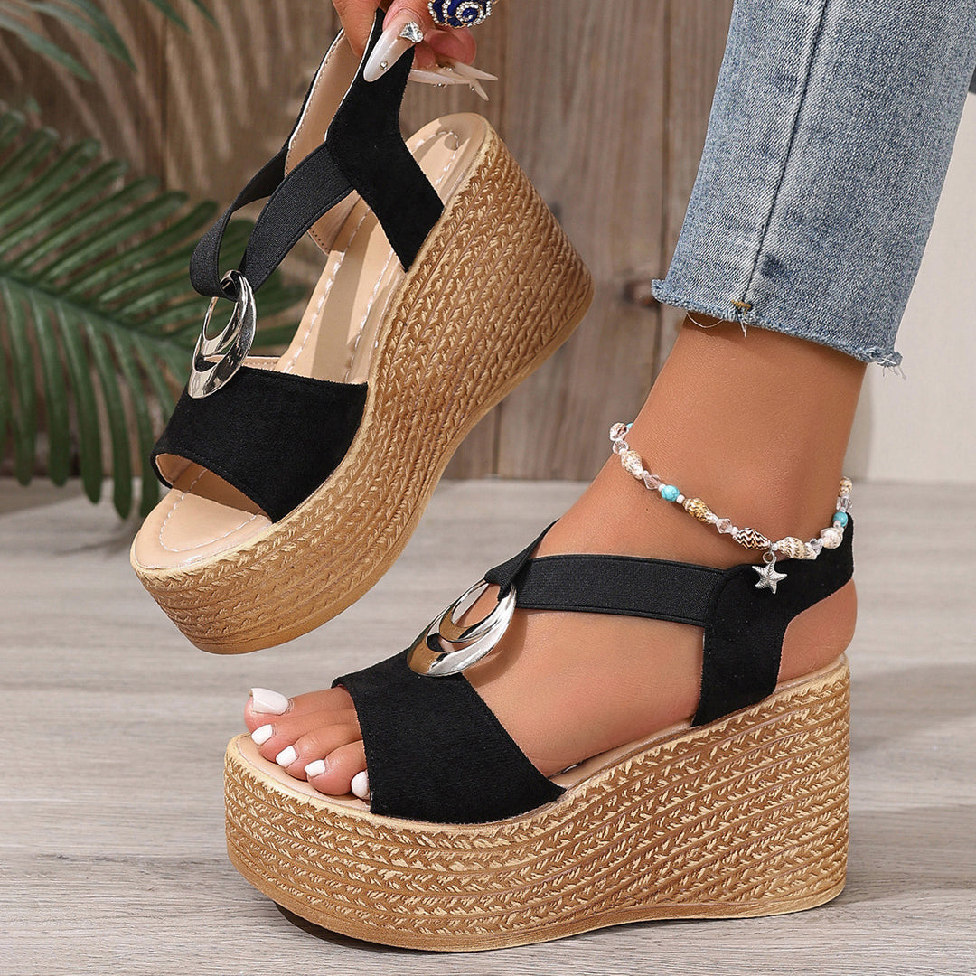 Women's retro-style wedge sandals with jute look, decorative metal ornament, and elastic heel strap Mune Fashion