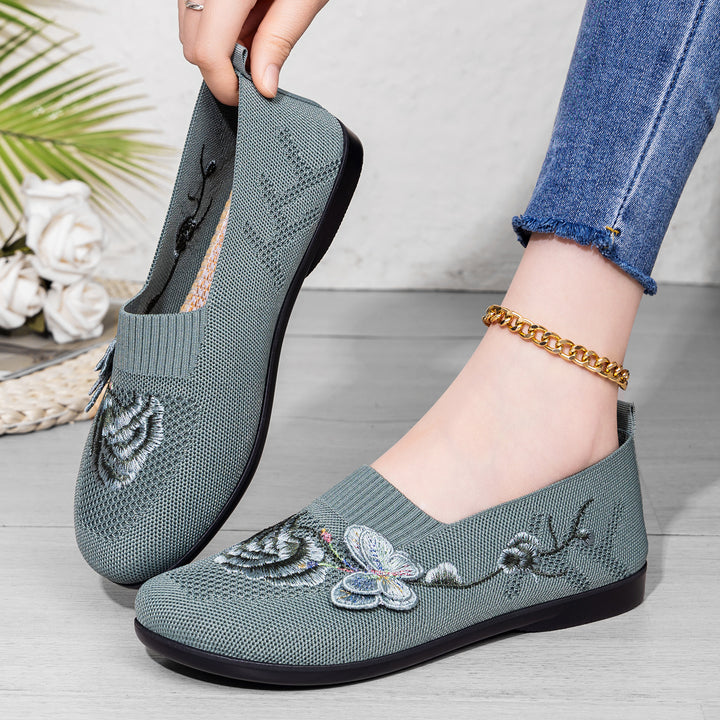 Women's embroidered knitted slipper with sock-like entry, floral embroidery design, and cushioned lightweight sole Mune Fashion