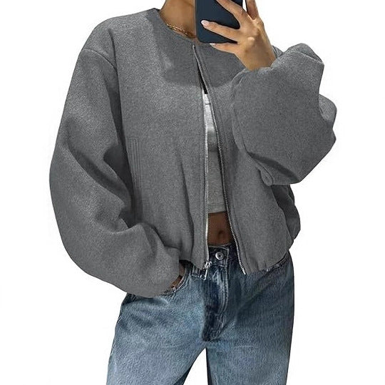 Women's short jacket with continuous zipper, balloon sleeves, and elastic hem Mune Fashion