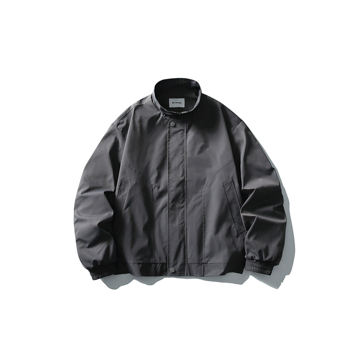 Unisex Short Cut Technical Boxy Bomber with Stand-up Collar, Snap Placket and Elastic Cuffs Mune Fashion