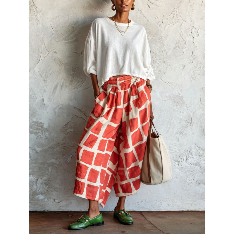 Women's patterned culotte palazzo pants with wide legs, elastic waistband, and side pockets