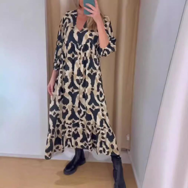 Women's flowing tiered maxi dress with V-neck, gathered bust panel and three-quarter sleeves Mune Fashion