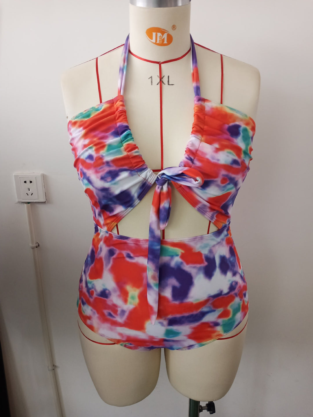 Women's one-piece swimsuit with playful knot and side cut-outs Mune Fashion