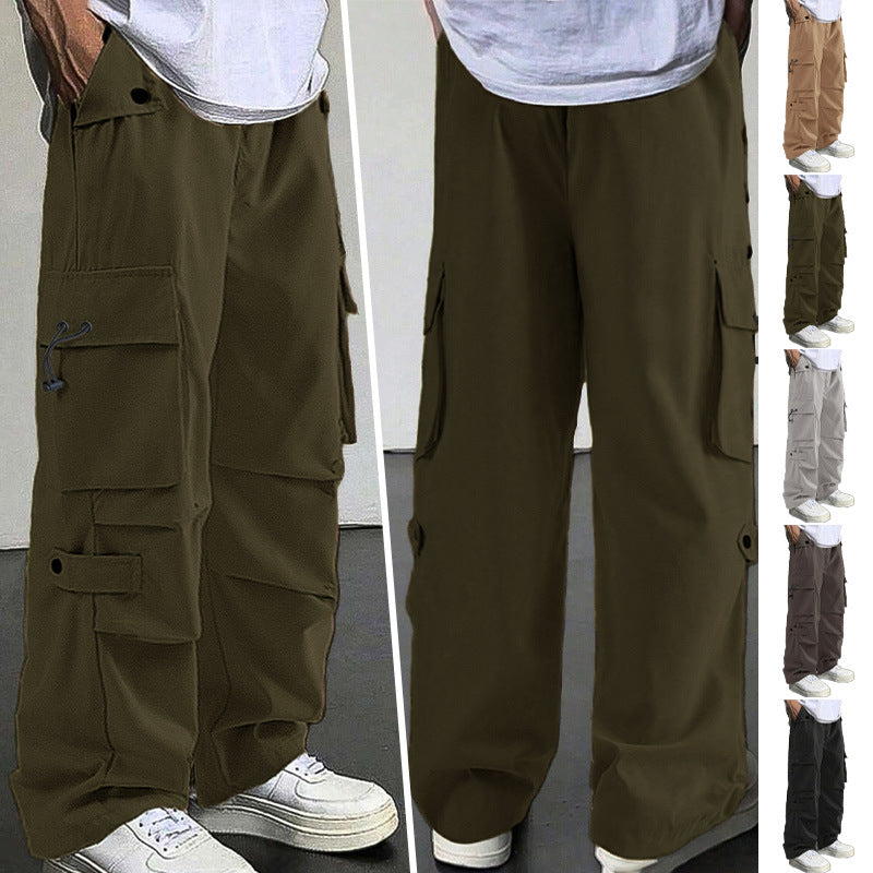 Men's baggy cargo pants with utilitarian flap pockets, drawstring waistband, and reinforced seams Mune Fashion