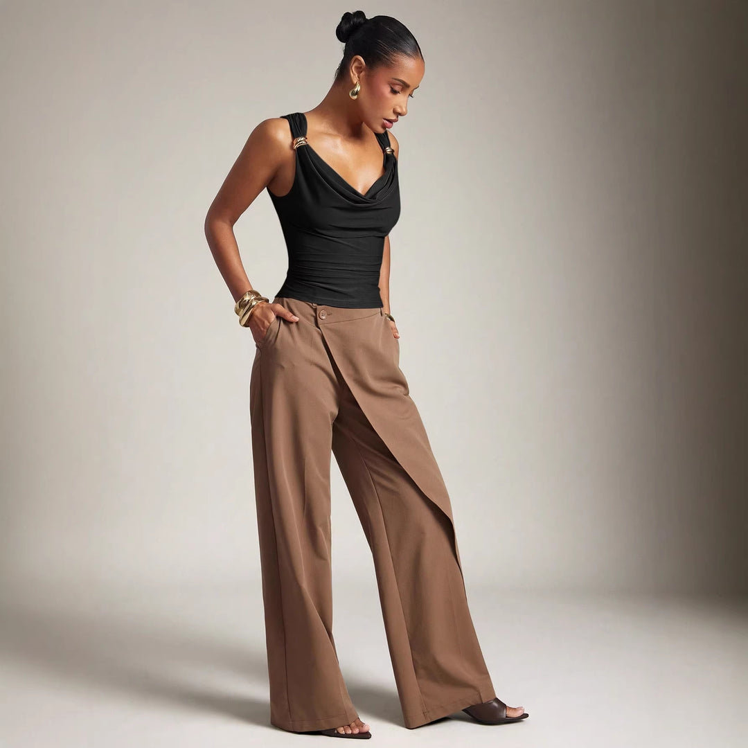 Ladies fitted top with draped neckline and decorative rings on the straps Mune Fashion