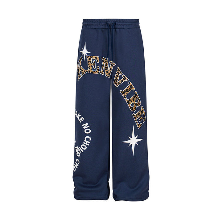 Women's wide jogging pants in culotte style with drawstring and statement print Mune Fashion