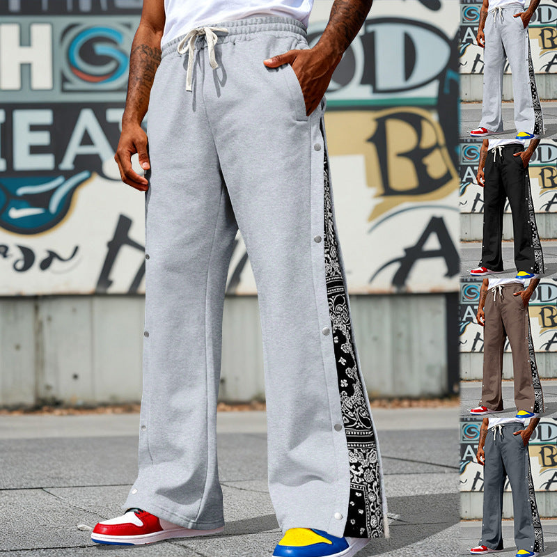 Men's loosely cut snap-front jogging pants with paisley side insert and elastic comfort waistband Mune Fashion