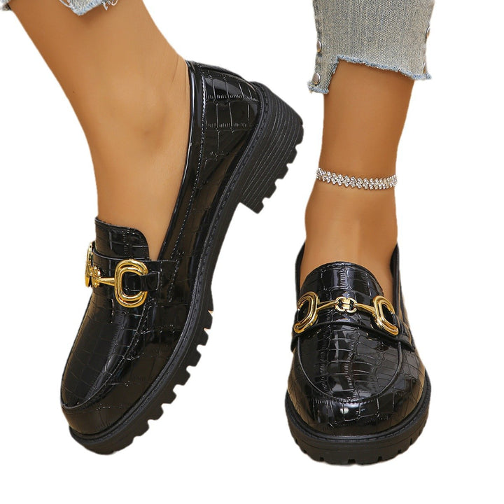 Women's loafers with glossy crocodile embossing, featuring a profiled tractor sole and golden decorative buckle Mune Fashion