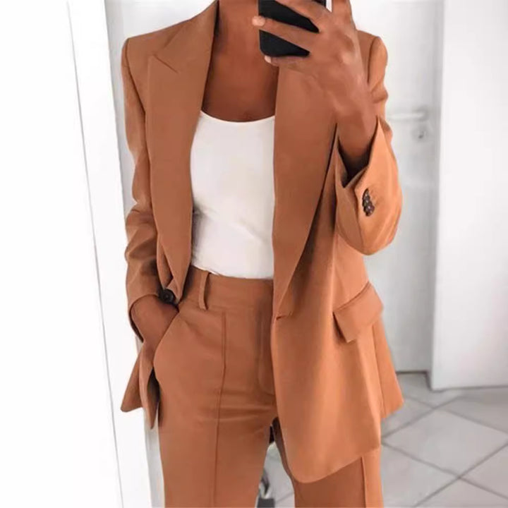 Women's nan Business Blazer Set with structured oversized silhouette, notched collar and pleated trousers Mune Fashion