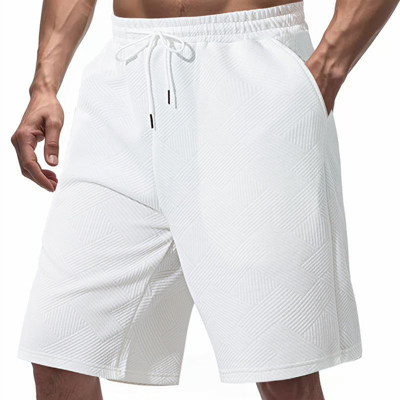 Men's knee-length textured swim shorts with elastic drawstring waistband and side pockets Mune Fashion