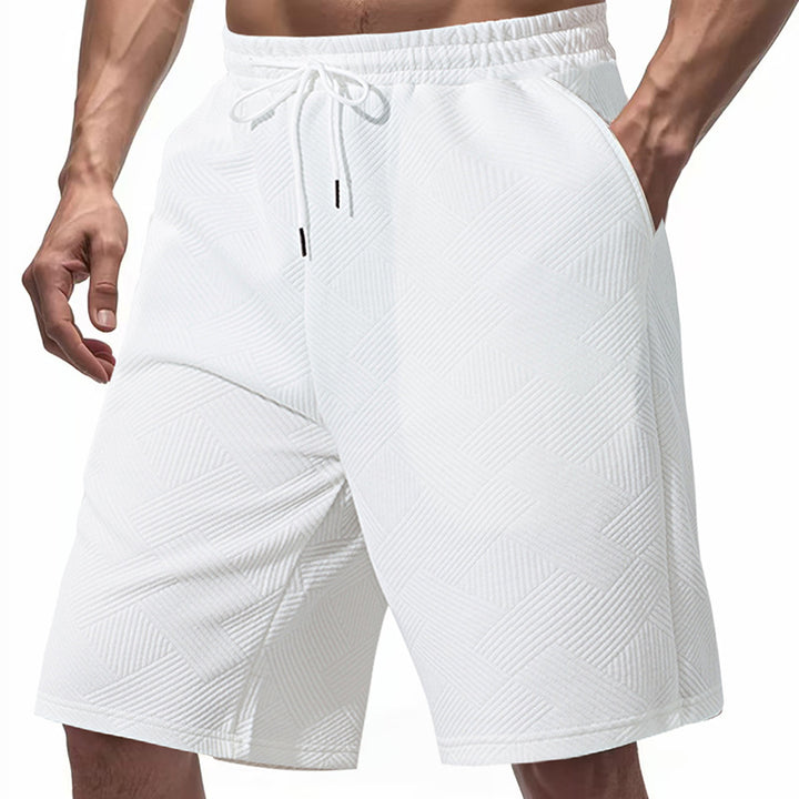 Men's knee-length textured swim shorts with elastic drawstring waistband and side pockets Mune Fashion
