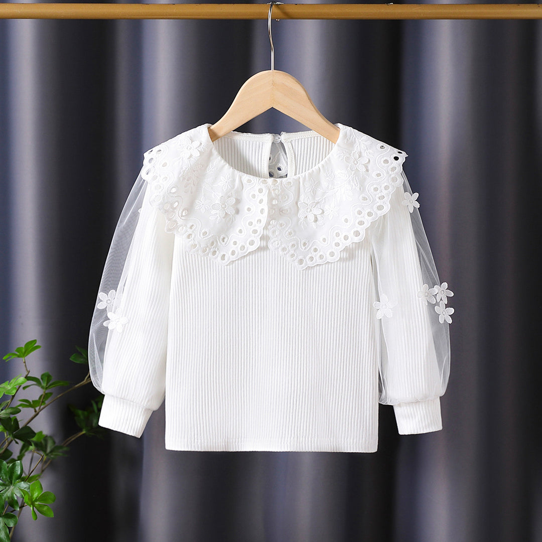 Girl's blouse with voluminous tulle sleeves and elaborate flower embroideries Mune Fashion