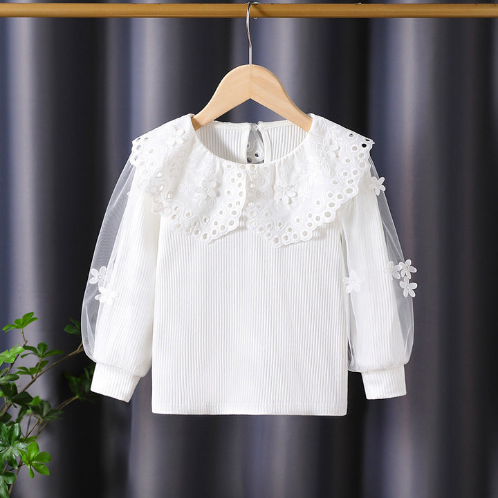 Girl's blouse with voluminous tulle sleeves and elaborate flower embroideries Mune Fashion