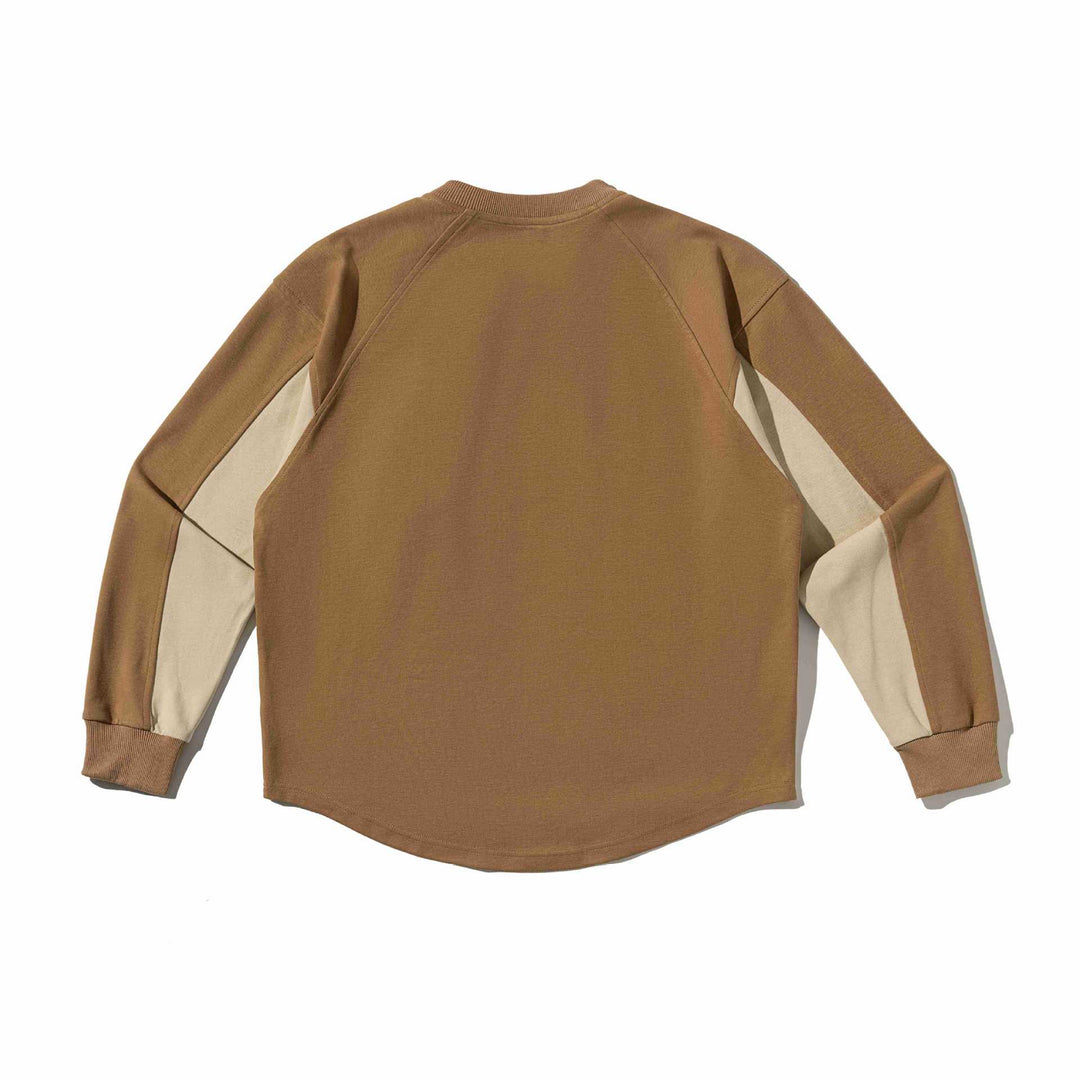 Unisex Raglan Sweatshirt with half-round hem and applied chest pocket Mune Fashion