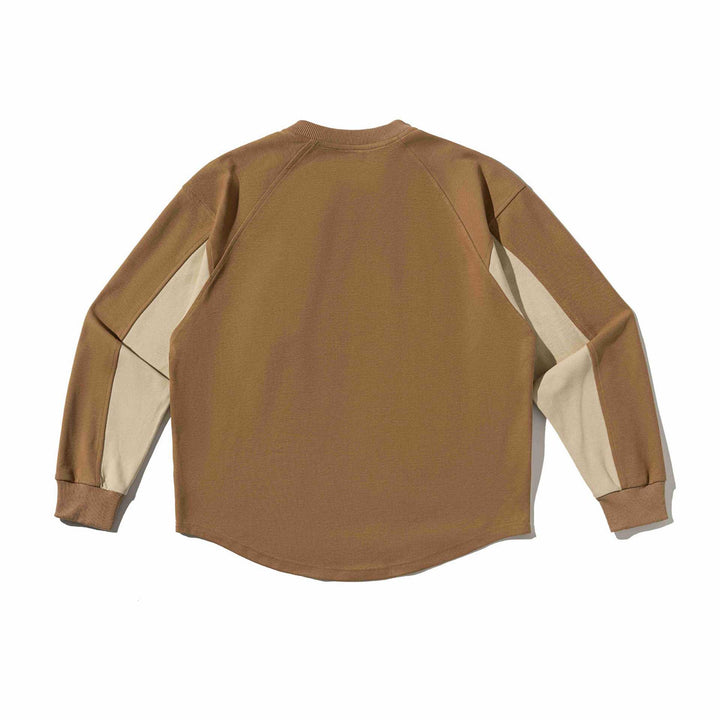 Unisex Raglan Sweatshirt with half-round hem and applied chest pocket Mune Fashion