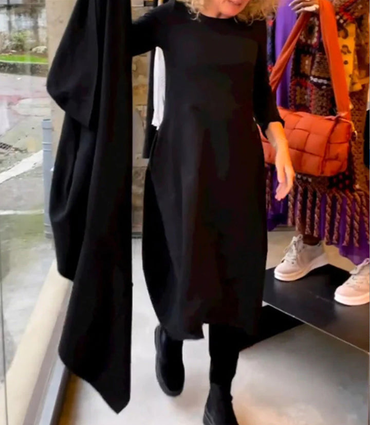 Women's asymmetrical balloon dress with three-quarter sleeves, side pockets, and flowing pointed hem Mune Fashion