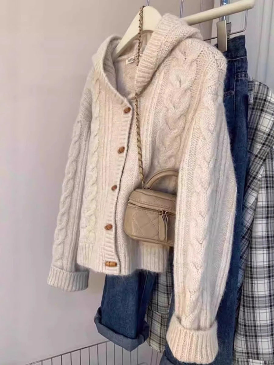 Women's hooded cardigan with cable knit, wooden button placket, and boxy silhouette Mune Fashion