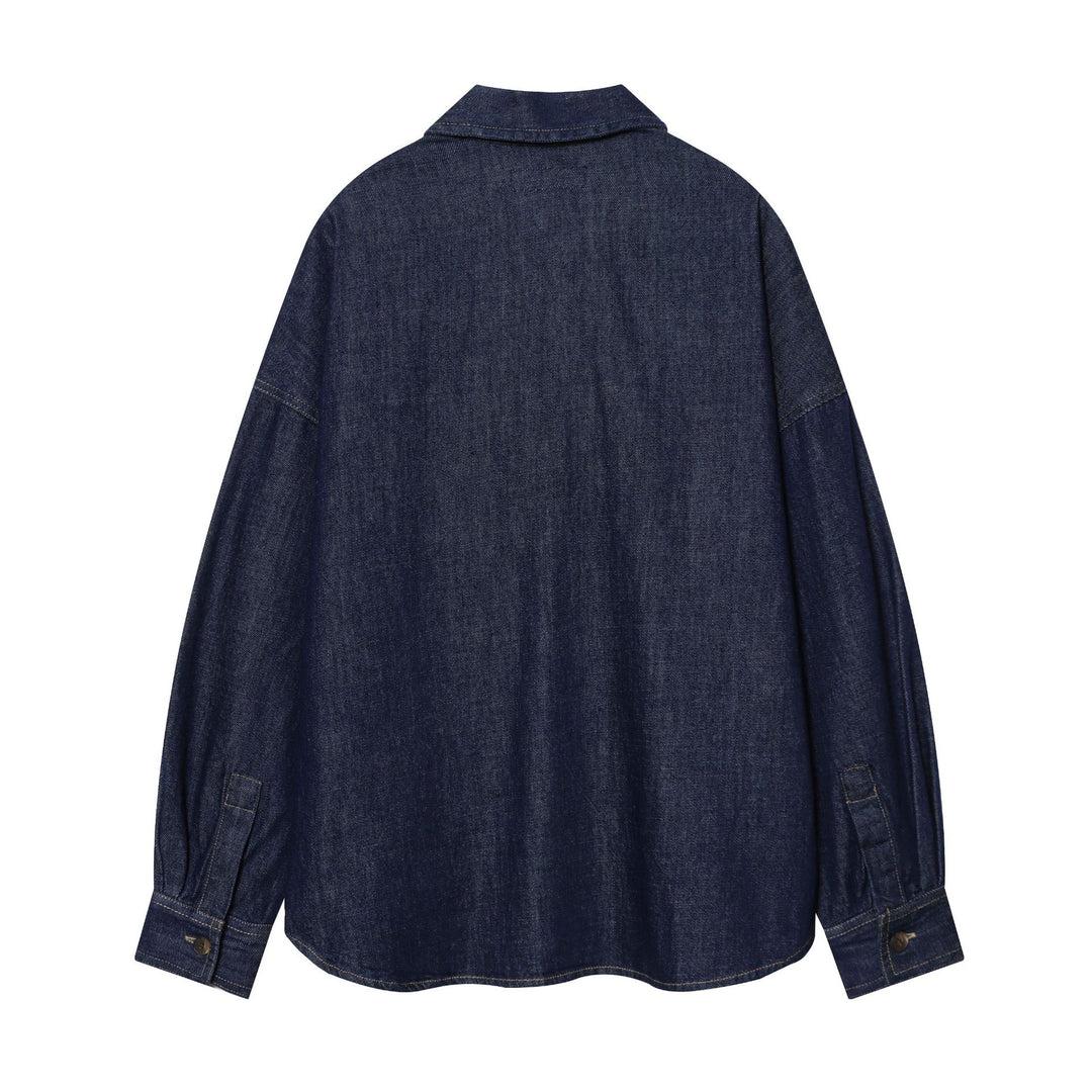 Women nan oversized denim blouse with concealed button placket, distinctive dividing seams, and boxy silhouette Mune Fashion