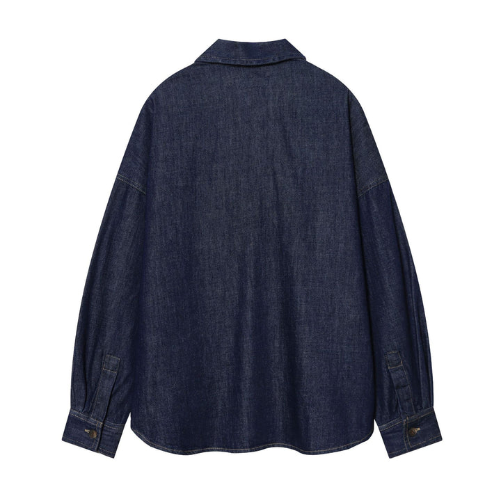 Women nan oversized denim blouse with concealed button placket, distinctive dividing seams, and boxy silhouette Mune Fashion