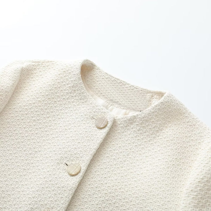Women nan short bouclé jacket with round neck, boxy cut and golden decorative buttons Mune Fashion