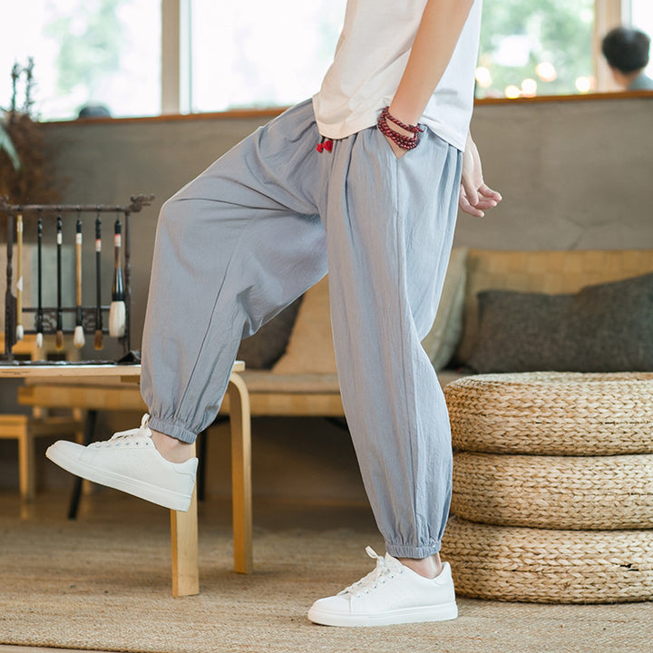 Men's loose harem pants with elastic waistband and decorative drawstring Mune Fashion