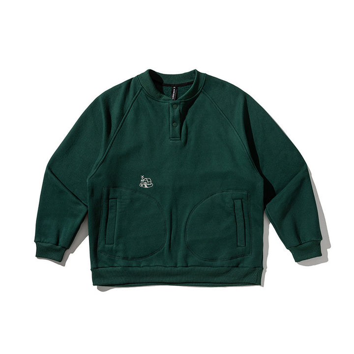 Unisex Oversize Henley Sweatshirt with raglan sleeves, button placket, and distinctive round pockets Mune Fashion