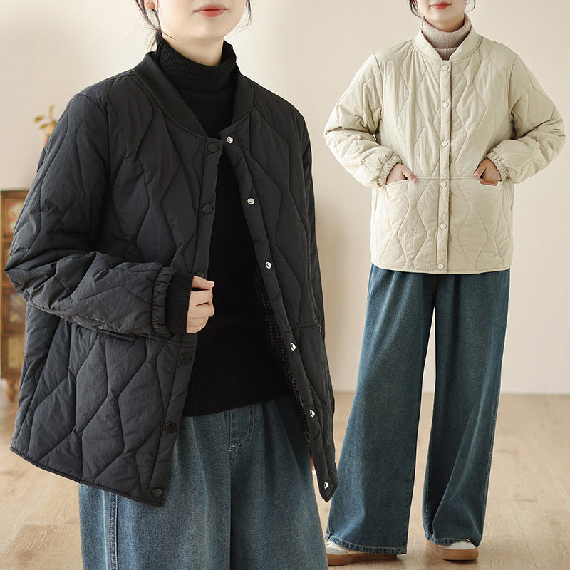 Women's lightweight padded transitional jacket with oversized cut, elastic sleeve cuffs and concealed snap button placket Mune Fashion