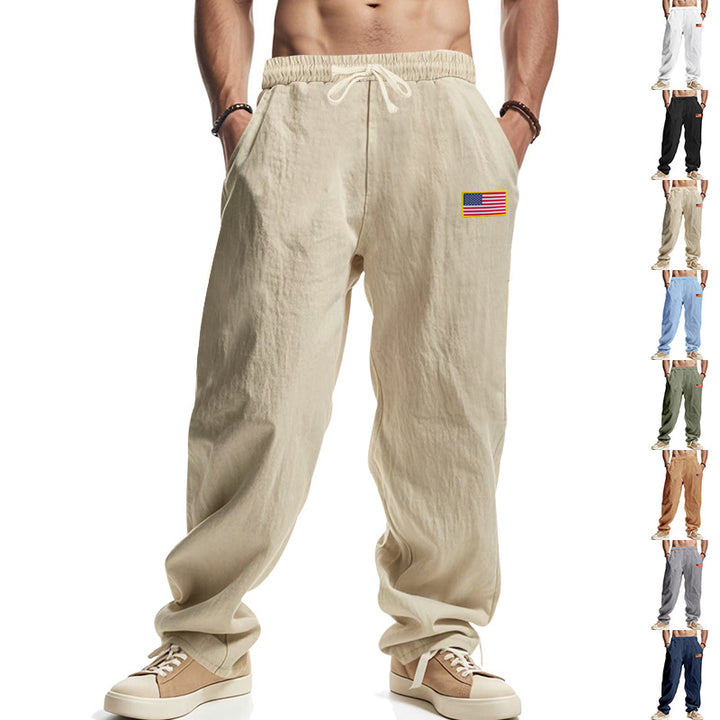 Men's relaxed leisure pants with elastic waistband, side pockets and flag patch Mune Fashion
