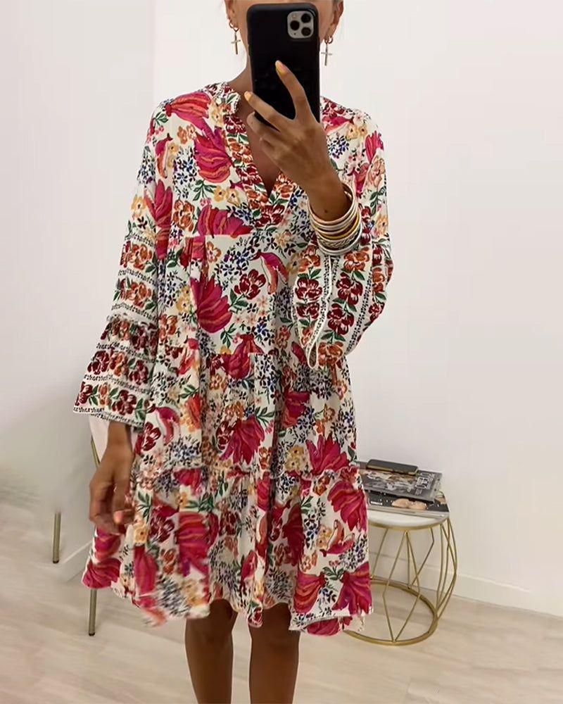 Ladies' floral ruffle mini dress in Boho style with V-neck and tiered silhouette Mune Fashion