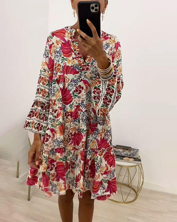 Ladies' floral ruffle mini dress in Boho style with V-neck and tiered silhouette Mune Fashion