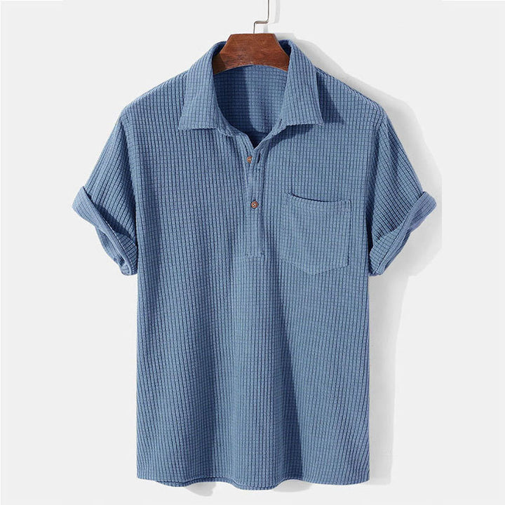 Men's waffle knit polo with shirt collar, short button placket and chest pocket Mune Fashion