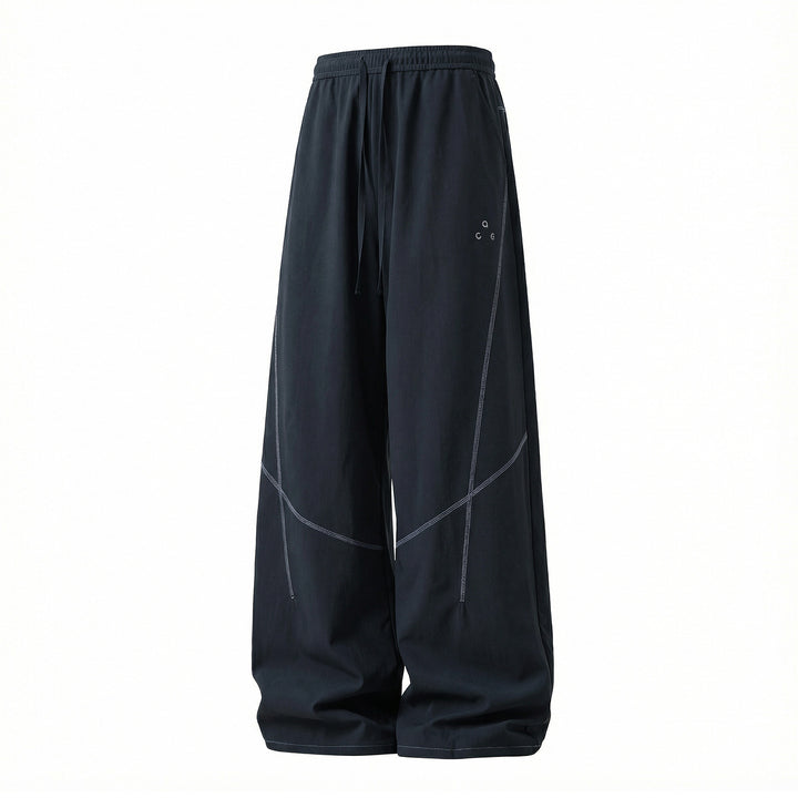 Unisex Extra wide training pants in palazzo cut with drawstring and striking decorative seams Mune Fashion