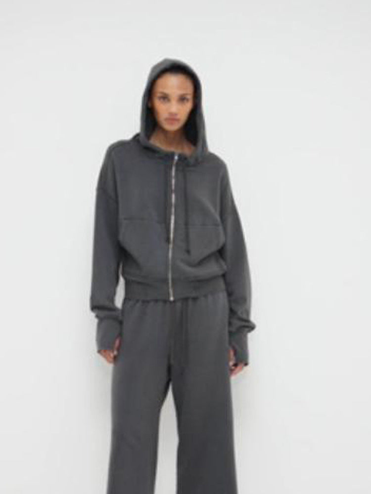 Ladies cropped hoodie sweatshirt with full zip, kangaroo pockets, and extended sleeve cuffs Mune Fashion