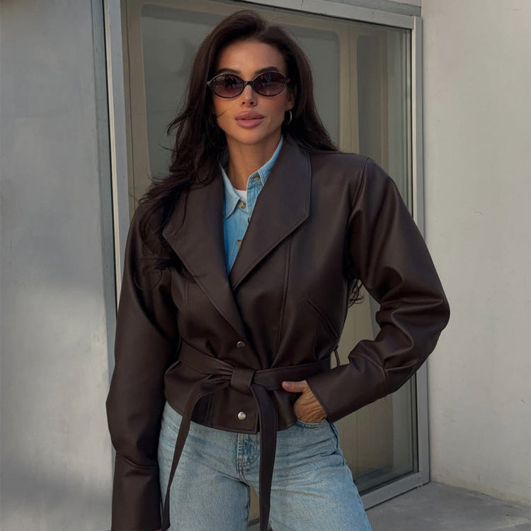 Women’s short blazer made of vegan leather with waist belt Mune Fashion