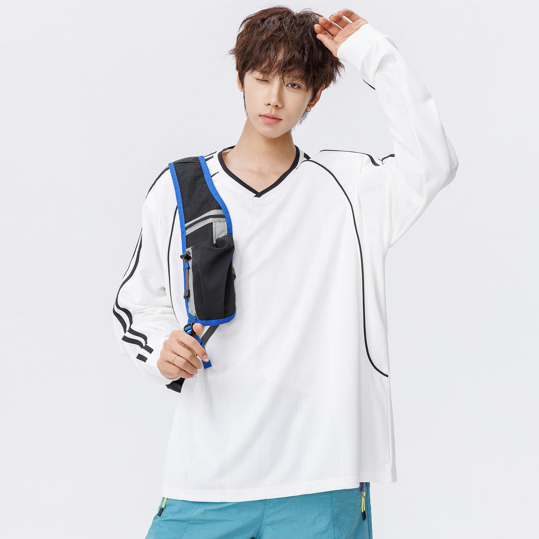Damen Weites V-Ausschnitt Oversize-Sportshirt mit Raglanärmeln und Kontraststreifen Mune Fashion