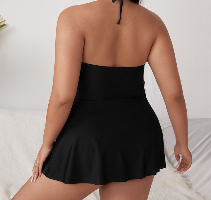 Women's beach dress with deep V-neck and decorative chain detail Mune Fashion