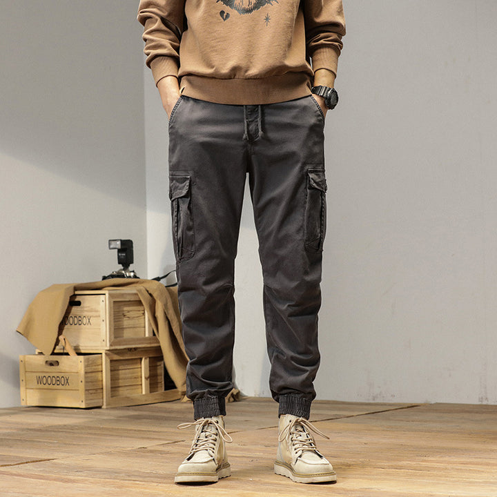Men's Tapered Cargo Jogger made of sturdy twill with drawstring waistband, flap pockets and ribbed ankles Mune Fashion