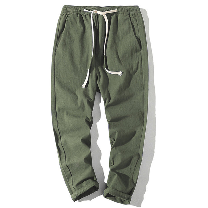 Men's lightweight linen trousers with elastic waistband and drawstring, tapered fit and roll-up hem Mune Fashion