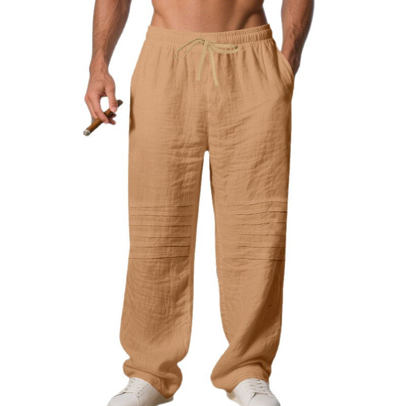 Men's loose linen jogging pants with elastic drawstring waistband, side pockets and padded knee sections Mune Fashion