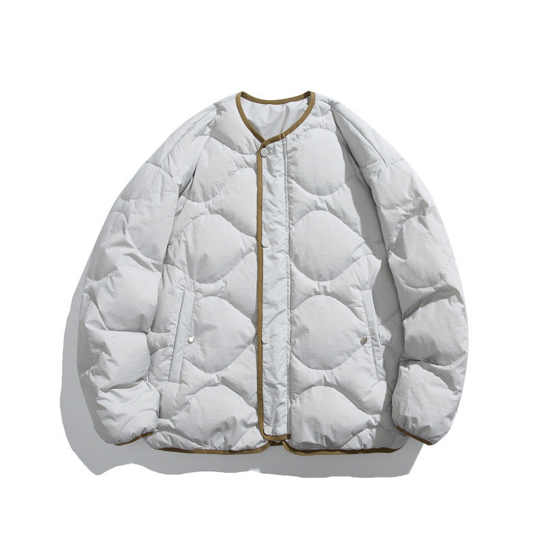 Unisex Kastig padded short jacket with circular quilting, round neckline and contrast piping Mune Fashion